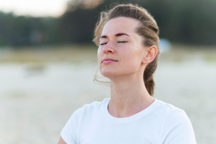 woman taking fresh ocean breez