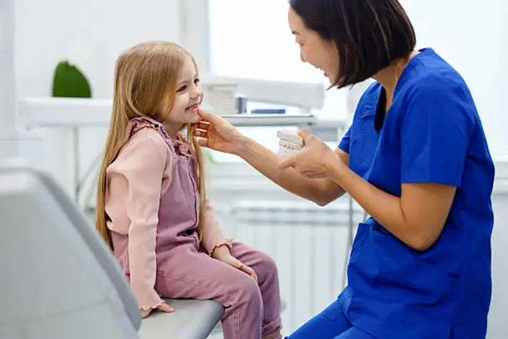 Airway dentist examining a child's mouth Buteyko Method Breathing